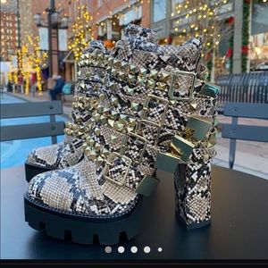 Material Snake leatherette. Heel is about 4in